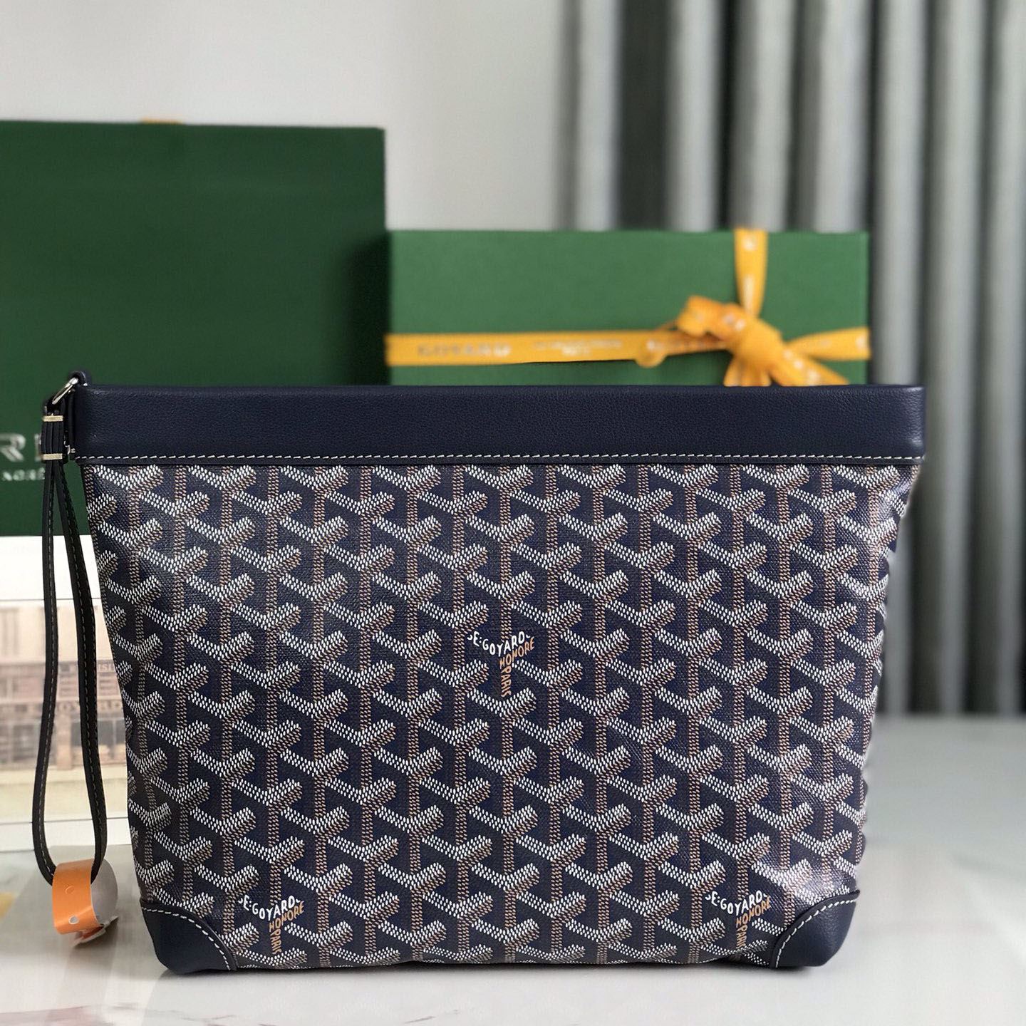 Go*ard clutch bags